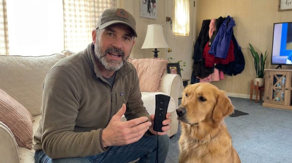 Luke holding PetGentle in his living room